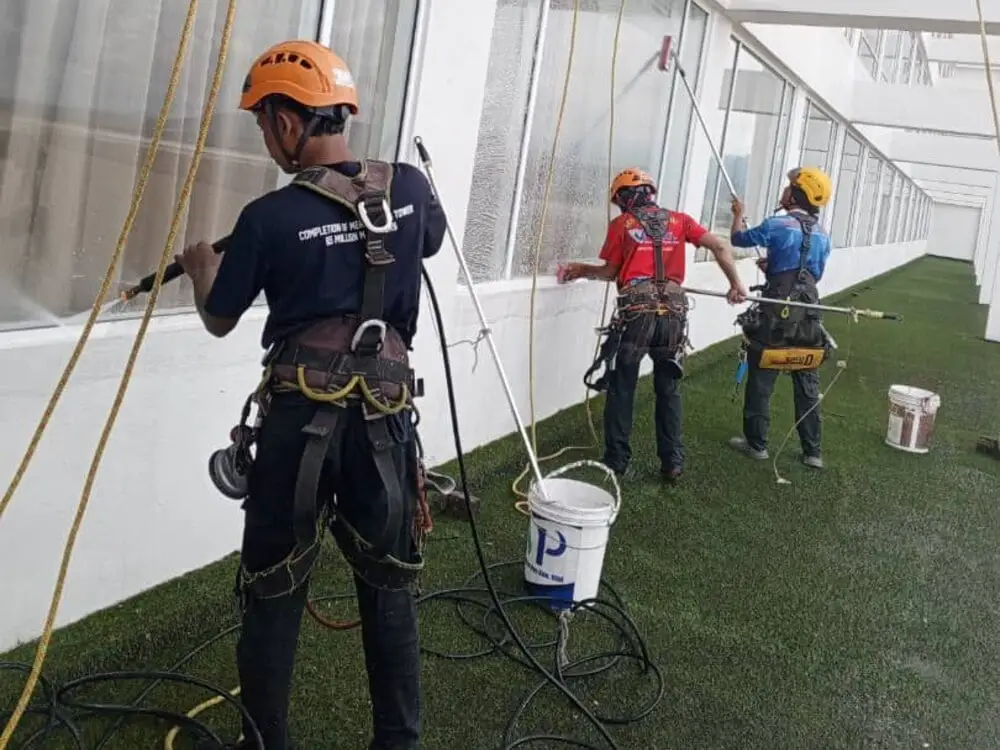 Vertical Pro rope access technicians descending on a high-rise facade